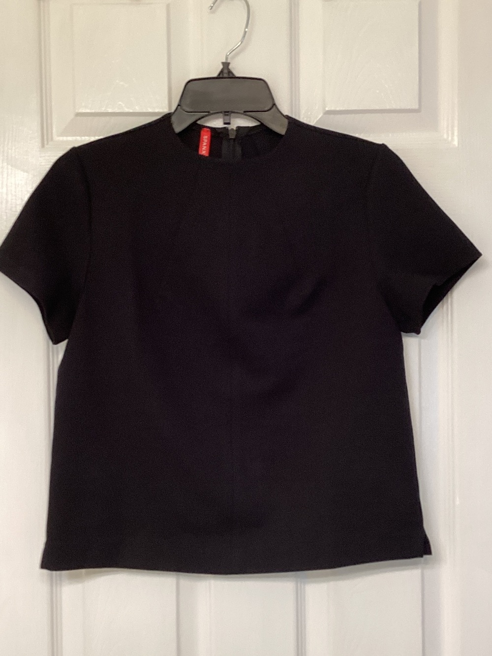 Spanx black dressy top, like new, size xs